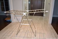 Full view of drying rack extended upright