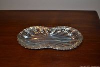 Full view of silver tray on wood surface