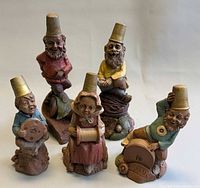 Group of five Tom Clark gnome sculptures