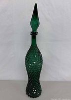 full view of green hobnail genie decanter with stopper
