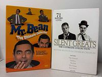 Front view of both DVD box sets showing titles and cover artwork