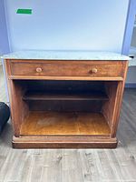 Front view showing full cabinet, drawer, shelf and condition