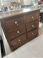 Front and side view of oak dresser showing six drawers and overall condition