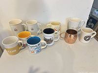 Group shot of all 10 assorted mugs