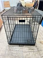 Front view of crate showing overall structure, tray installed