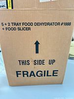 cardboard shipping box showing product name and model