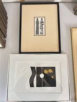 Both framed prints side by side showing frames and mats