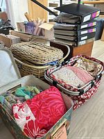 Overall lot showing baskets, binders, boxes and contents