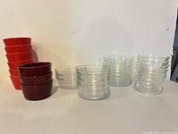 All ceramic and glass ramekins stacked by color and material