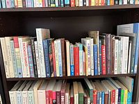 Full shelf showing majority of book spines