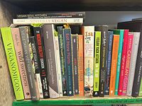 Full shelf view showing majority of the 42 cookbooks