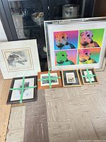 All six framed dog prints grouped together for size and content overview