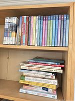 Shelf showing DVDs and magazines