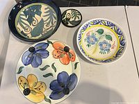 Group view of all four ceramic pieces