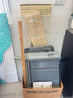Box with large cutting mats, Westcott trimmer, acrylic rulers, yardstick