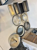 All 14 bakeware pieces laid out on table