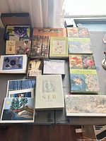 Tabletop view of all boxed and wrapped card sets