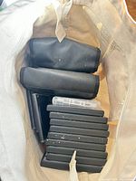 CD and cassette cases plus carrying pouches inside bag