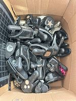 Box of assorted black Stampin' Up! punches