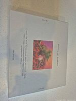Front of sealed box showing Enigma Art Puzzles branding and artwork