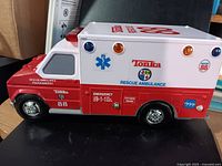 Side view of Tonka Rescue 88 ambulance showing decals, wheels, lights