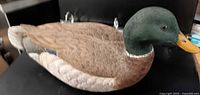 profile view of carved mallard decoy