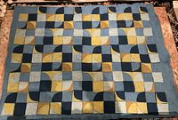 Full view of wall hanging laid flat