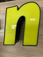 Front view of yellow marquee letter n