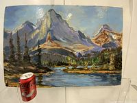 Full view of unframed oil painting on board with Coca-Cola can for scale