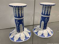 Front view showing both candlesticks and relief detail