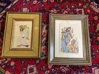 Both framed Persian figural paintings side by side