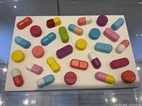 Top view of pill sculpture on white base