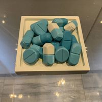 Top view showing pill forms within square base