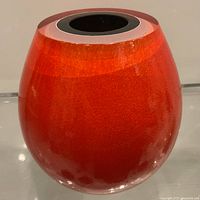 Front view of red triple-cased glass vase