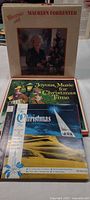 Front view showing three albums: Christmas With Maureen Forrester, Joyous Music For Christmas Time box, Christmas compilation