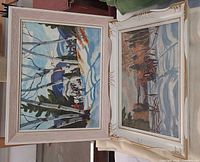 Both framed paintings side by side to show set