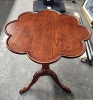 Top view showing clover-shaped mahogany surface