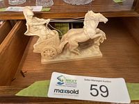 Full view of A. Santini chariot sculpture inside drawer