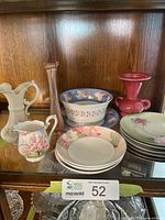 Group shot showing all china and glass pieces on shelf