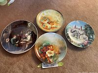 Group shot of all four decorative plates