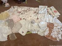 Overview of all linens laid out with plush hedgehog centered