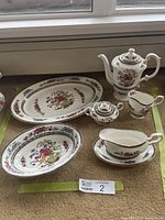 Entire set of seven Paragon Tree of Kashmir serving pieces laid out