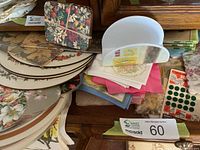 Overview showing napkin holders, stacks of napkins, coasters and placemats