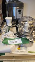 Overview of Cuisinart chopper/grinder, Instant rice cooker, Sunbeam mixer and cords
