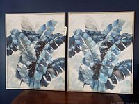 Front view of both framed banana leaf canvases