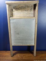 Front view of wooden Economy Zinc washboard