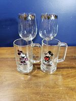 Full set of two wine glasses and two character mugs