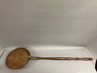 Full view bed warmer showing length and pan