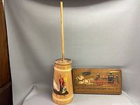Full view of butter churn with plaque