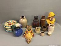 Group view of all pottery pieces and plates